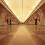 a group of people standing in a tunnel