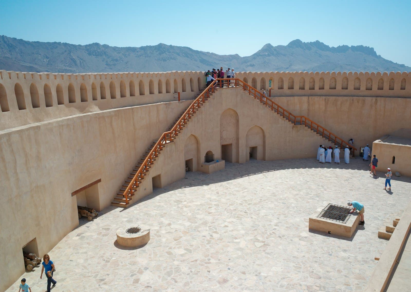 Ramal Tours – nizwa a large circular structure with people standing on it