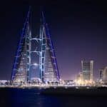 triangular-shape tower near body of water
